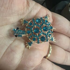 Mint Gold and Blue Brooch with Intricate Design